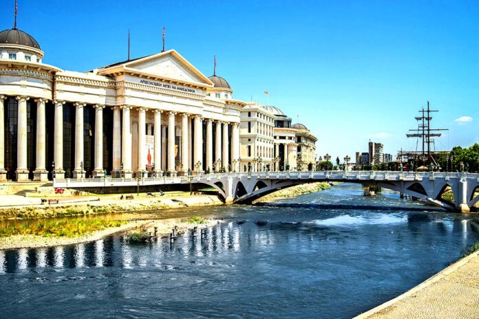 Archaeological Museum of Macedonia surrounded by the river with a bridge on it in north Macedonia Archaeological Museum of Macedonia surrounded by the river with a bridge on it in north Macedonia