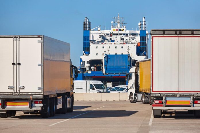 Transportation and logistic industry. Trucks and vessel in the h