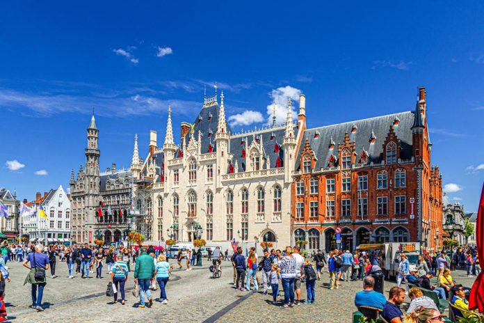 Bruges,,Belgium,,July,5,,2023:,Many,People,Tourists,Walking,Down