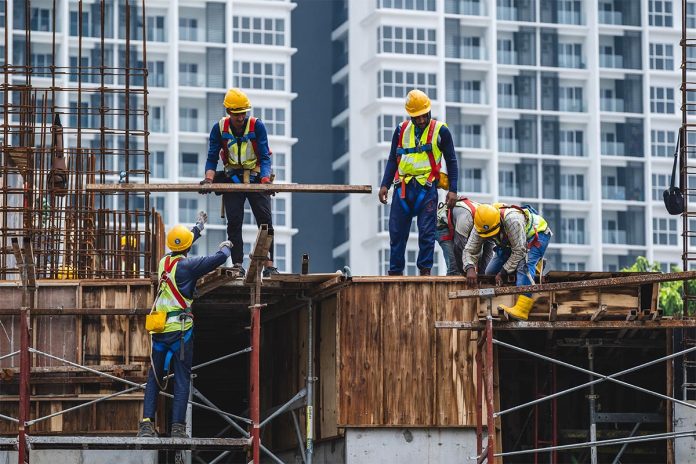 Kuala,Lumpur,,Malaysia,-,March,25,,2024:,Construction,Workers,Wearing
