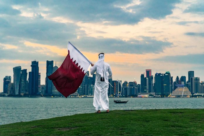 Qatar,National,Day,Male,With,Qatar,Flag