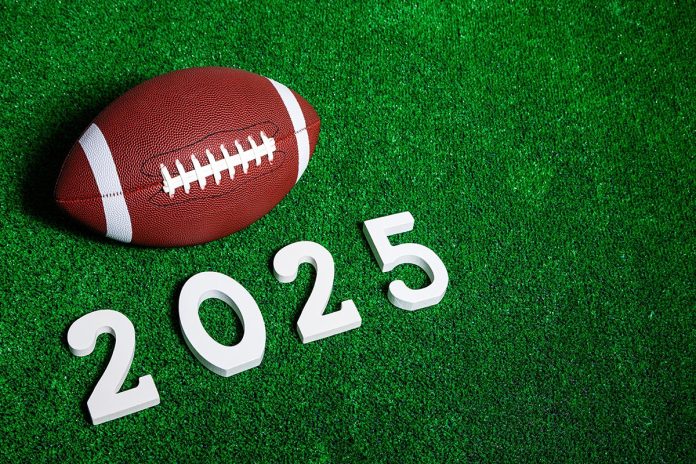 American,Football,Ball,Next,To,2025,Number,Whose,Figures,Are