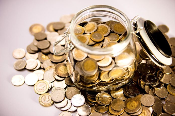 Glass,Jar,Of,Euro,Money,Inside,And,Bosnian,Coins,Outside