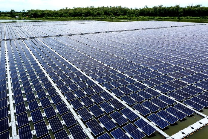 Aerial,View,Of,Floating,Solar,Panels,On,A,River,,Part