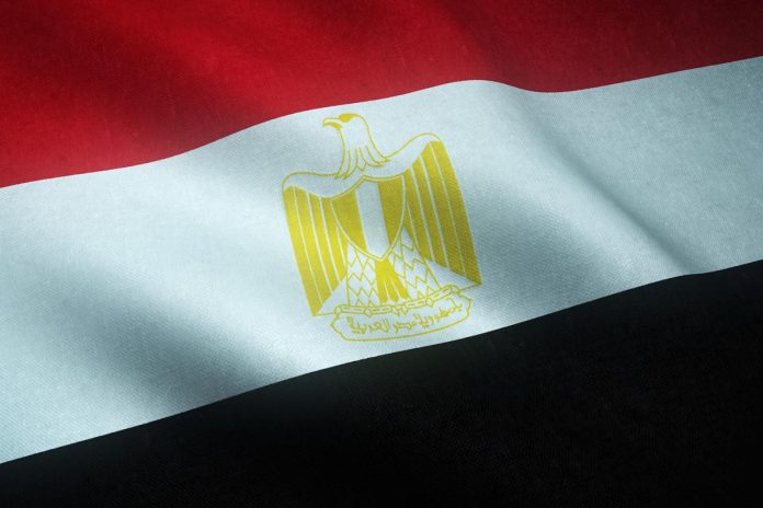 Closeup shot of the waving flag of Egipt with interesting textures