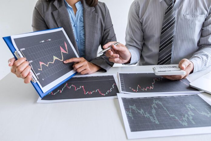 Business team on meeting to planning investment trading project