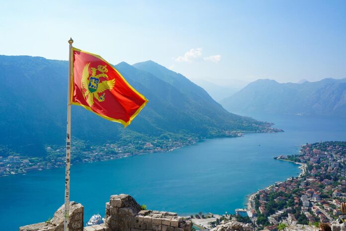 Landscape,With,The,Flag,Of,Montenegro,,A,Small,European,Country