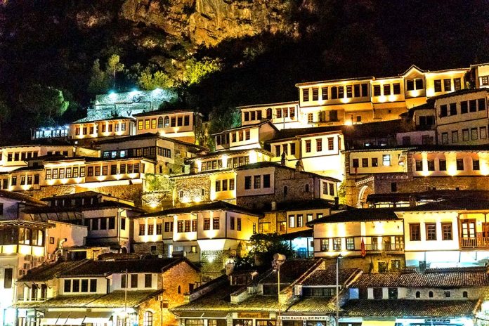 Windfarms Would Bring Advances Detail of the beautiful houses of the illuminated historical city of Berat in Albania