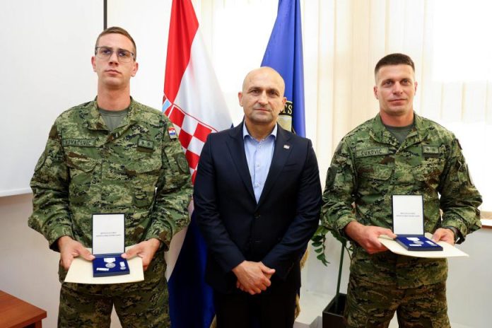 Croatian Soldiers Honoured After Saving Man From Burning Car in Lithuania Croatian Soldiers Honoured After Saving Man From Burning Car in Lithuania