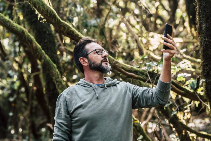 EU & Western Balkans Cut Roaming Charges adult-people-caucasian-man-in-the-forest