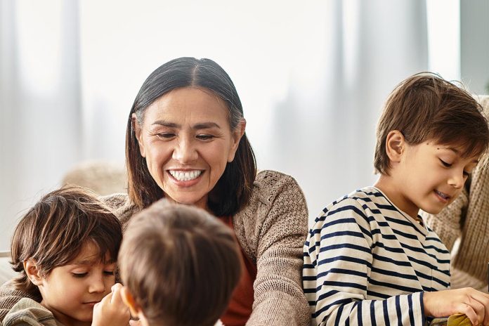 A happy family enjoys their time, sharing laughter and gifts in