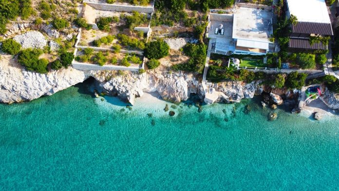 Enchanting Lands Await: Dive into the Alluring Depths of Albania beautiful-coast-beach-on-a-sea-in-qeparo-albania