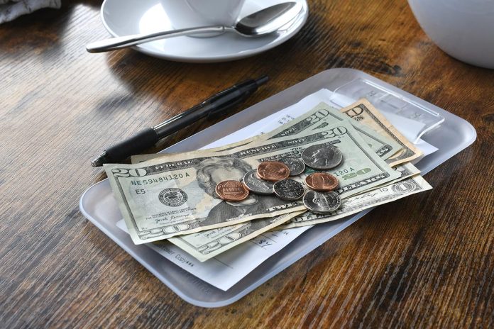 paying-for-your-bill-tab-at-a-restaurant-cafe-with-2026