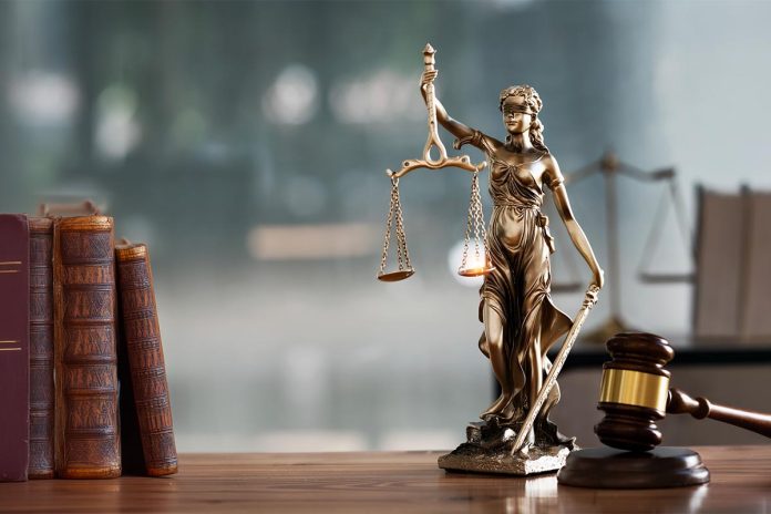 Legal and law concept. Statue of Lady Justice with scales of jus